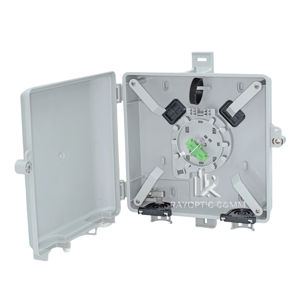 Front-open view of Fiber NID outdoor enclosure showing internal fiber termination and splicing area.