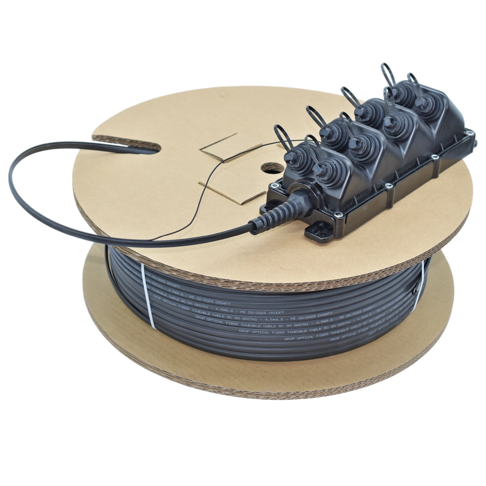 OptiTap compatible MST fiber terminal on cardboard reel for outdoor FTTH drop cable deployment