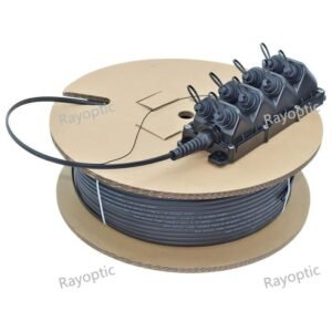 OptiTap-compatible MST fiber terminal on cardboard reel for outdoor FTTH drop cable deployment
