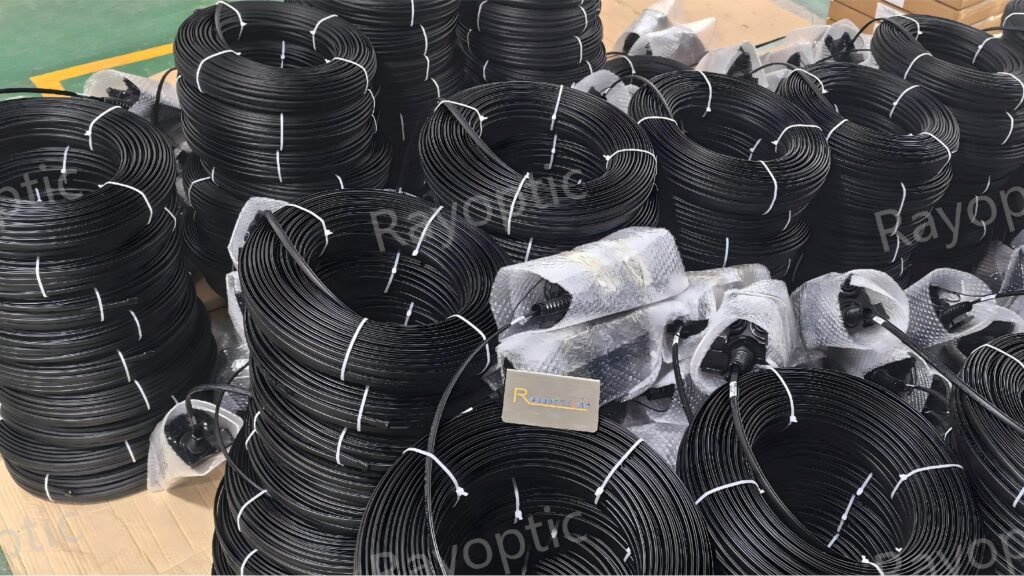 Bulk production of Rayoptic pre-terminated hardened drop cables for FTTH outdoor deployment